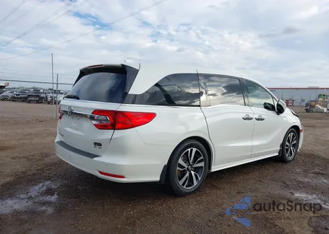 2018 Honda Odyssey Elite z USA, uszkodzony, nr VIN 5FNRL6H93JB050043